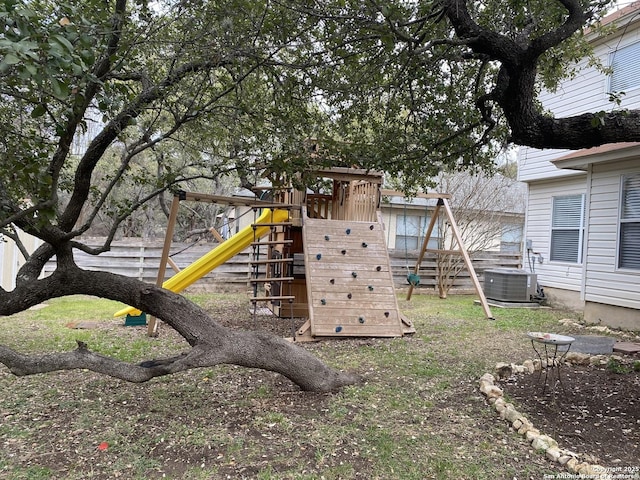 view of jungle gym with central AC unit