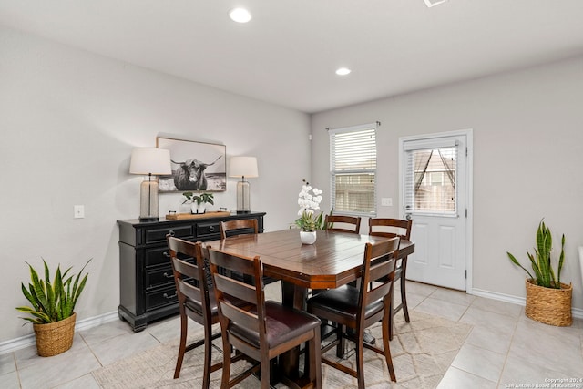 dining room featuring light tile patterned flooring