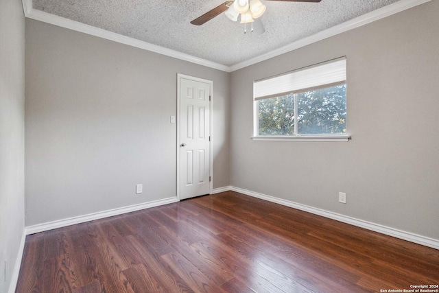 unfurnished room featuring a textured ceiling, dark hardwood / wood-style flooring, ceiling fan, and crown molding