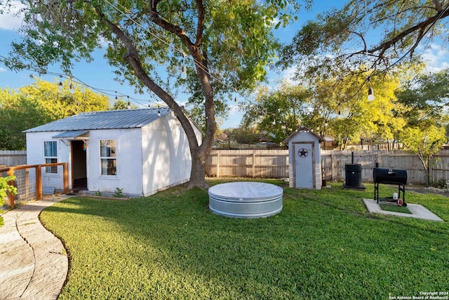 view of yard with a shed