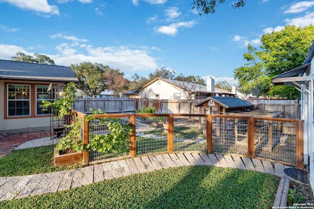 wooden deck with a yard