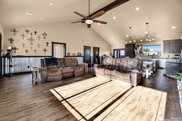 living room featuring ceiling fan, dark hardwood / wood-style flooring, and high vaulted ceiling