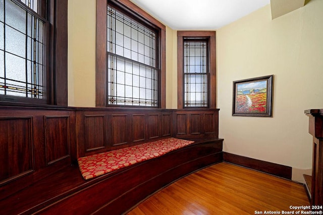 unfurnished room with wood-type flooring