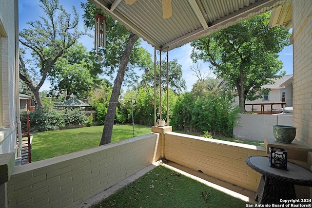 view of patio / terrace featuring ceiling fan