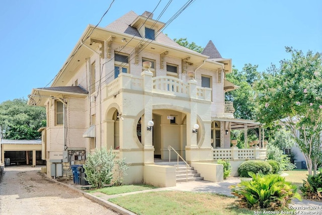 view of front of property with central AC