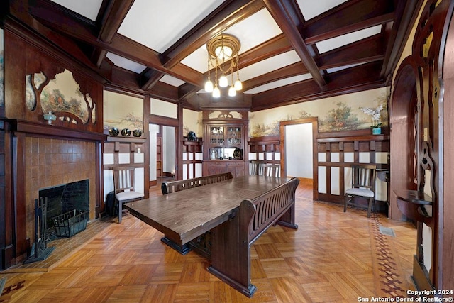 dining area featuring a chandelier, light parquet floors, beamed ceiling, and coffered ceiling