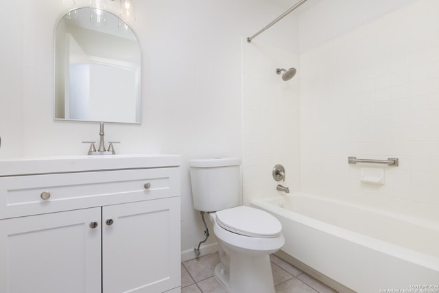 full bathroom with toilet, vanity, tile patterned floors, and tiled shower / bath