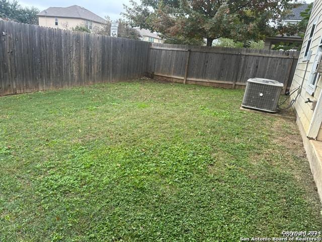 view of yard featuring cooling unit