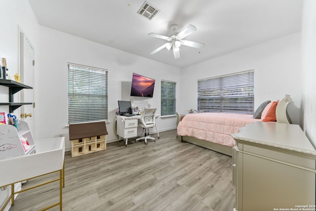 bedroom featuring ceiling fan and light wood-type flooring