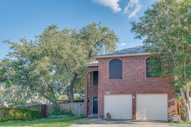 view of front of property featuring a garage