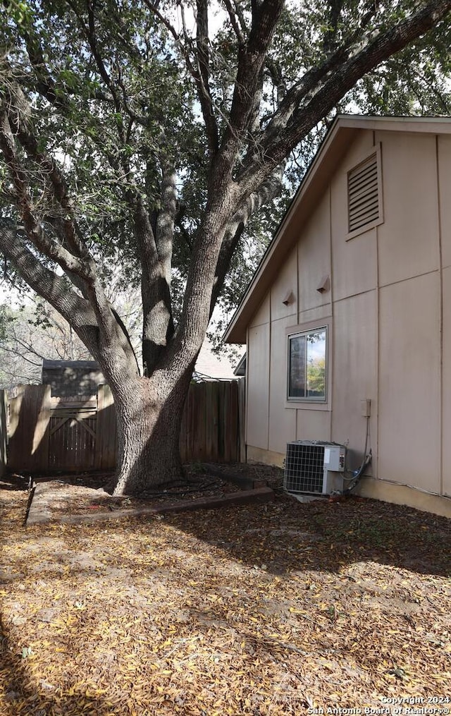 view of property exterior with cooling unit