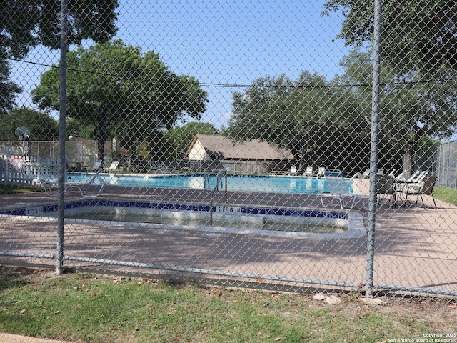 12047 Stoney Brg, San Antonio, TX 78247 - community pool featuring fence