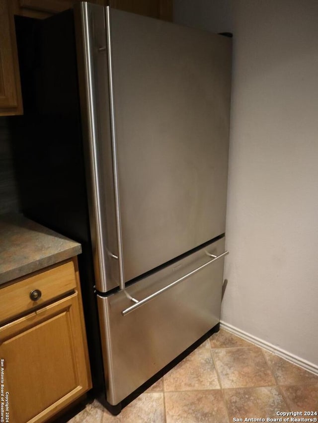 room details with stainless steel fridge