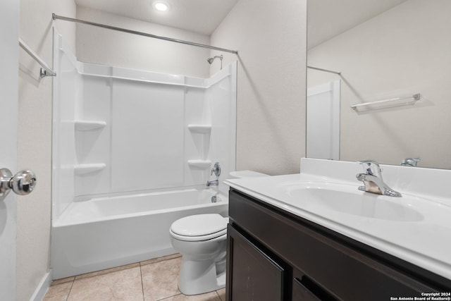 full bathroom featuring toilet, vanity, bathing tub / shower combination, and tile patterned floors