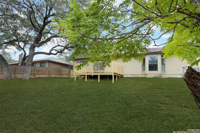 view of yard featuring a deck