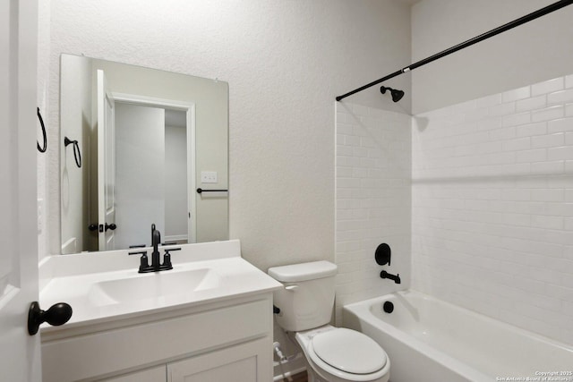 full bathroom with bathtub / shower combination, vanity, and toilet