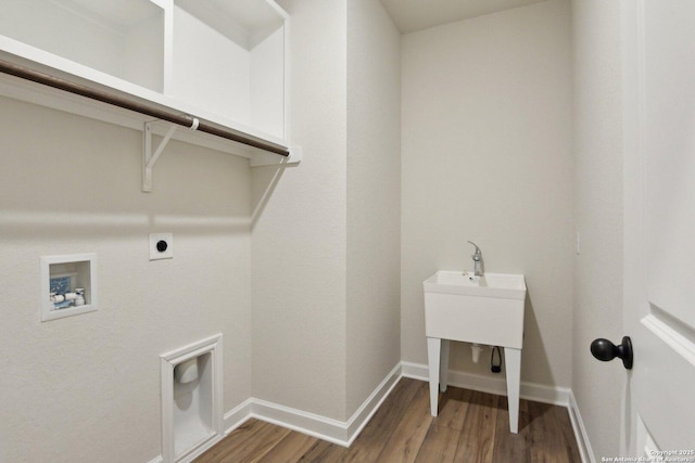 laundry area featuring hookup for a washing machine, electric dryer hookup, and hardwood / wood-style floors