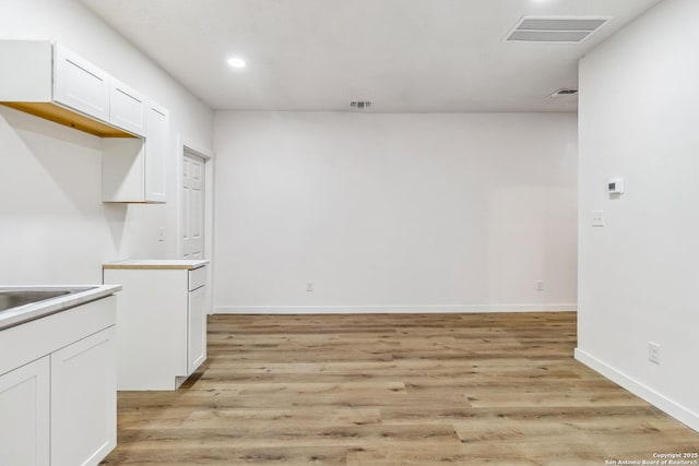 1206 W Hein Rd, San Antonio, TX 78220 - interior space featuring recessed lighting, light wood-style flooring, and visible vents