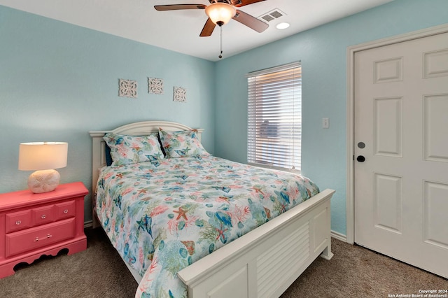 carpeted bedroom with ceiling fan