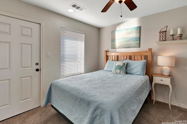 carpeted bedroom featuring ceiling fan