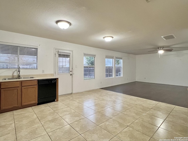 kitchen with dishwasher, light tile patterned floors, ceiling fan, and sink