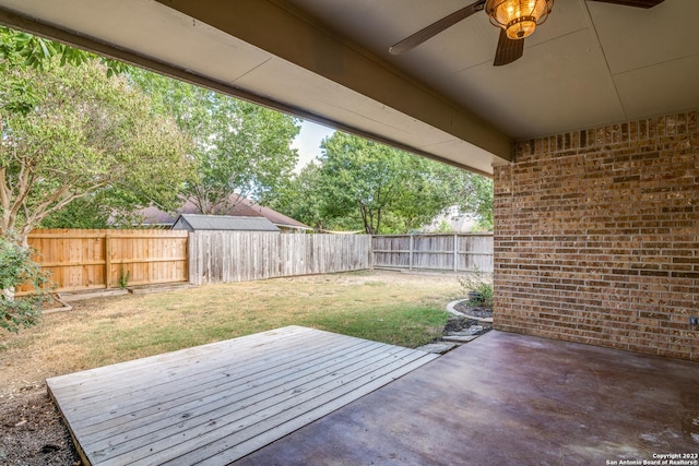 view of patio featuring ceiling fan