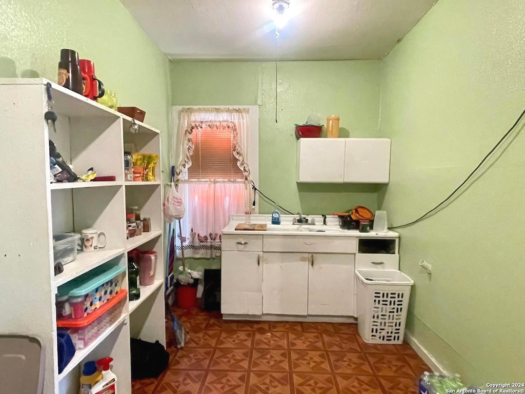 laundry area with sink