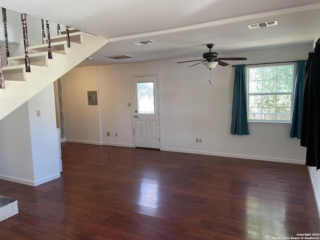 entryway with electric panel, ceiling fan, and dark hardwood / wood-style floors