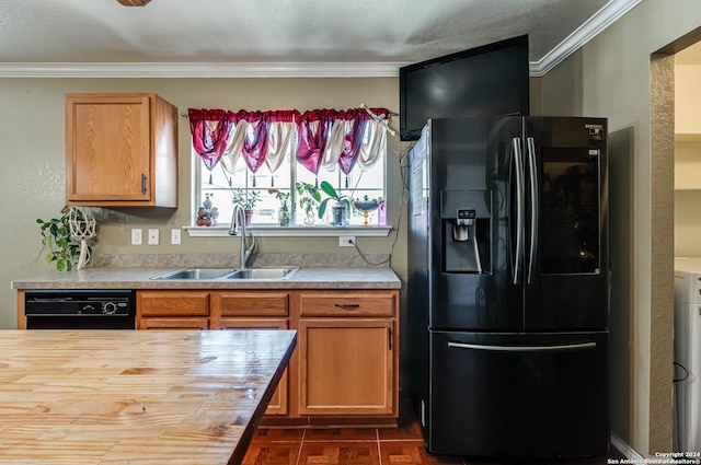 kitchen with black appliances, ornamental molding, sink, and wooden counters