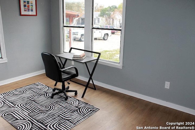 home office featuring light wood-type flooring