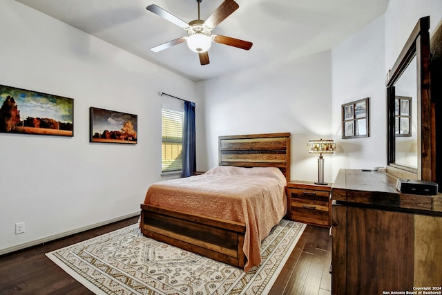 bedroom featuring dark hardwood / wood-style floors and ceiling fan