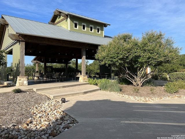 view of community featuring a gazebo and a patio