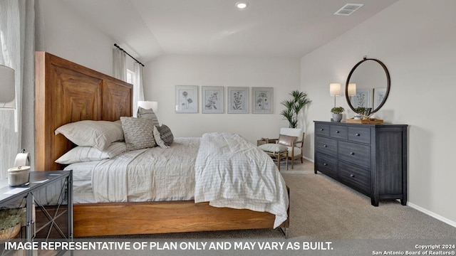 carpeted bedroom featuring lofted ceiling