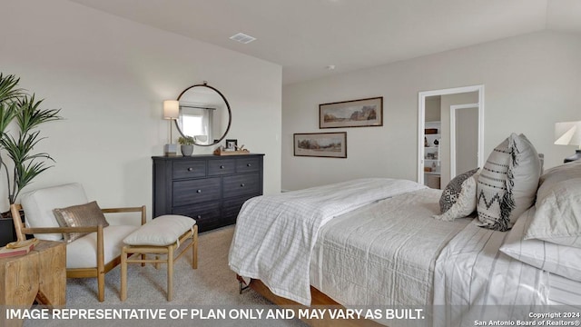 carpeted bedroom with vaulted ceiling