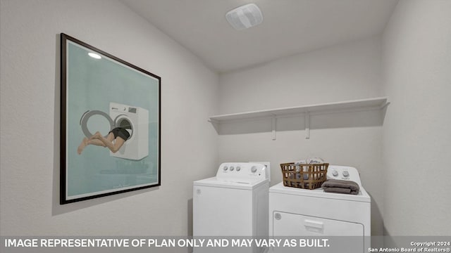 laundry room featuring separate washer and dryer