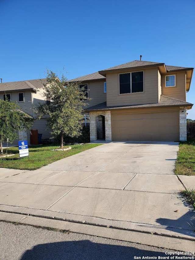 front of property featuring a garage