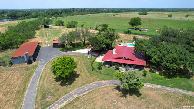 birds eye view of property featuring a rural view