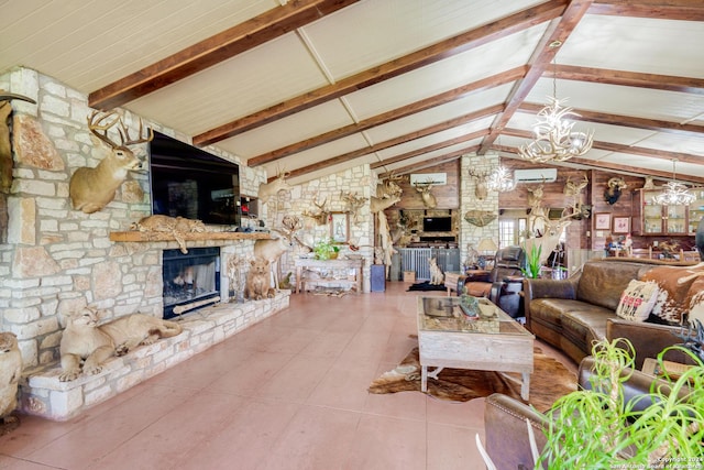 living room featuring lofted ceiling with beams, an inviting chandelier, an AC wall unit, tile patterned flooring, and a stone fireplace