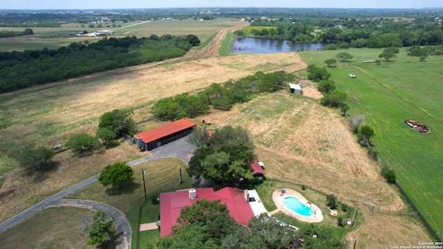 bird's eye view featuring a rural view and a water view