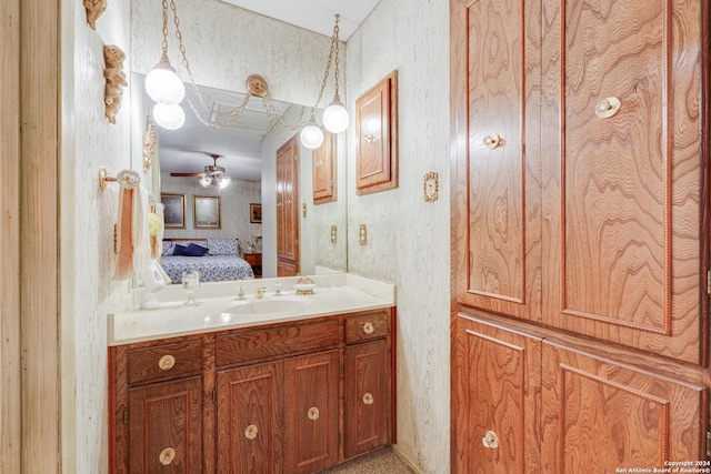 bathroom featuring ceiling fan and vanity