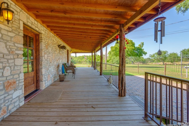 wooden deck featuring a porch