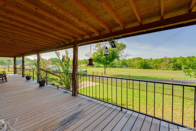 wooden deck with a yard