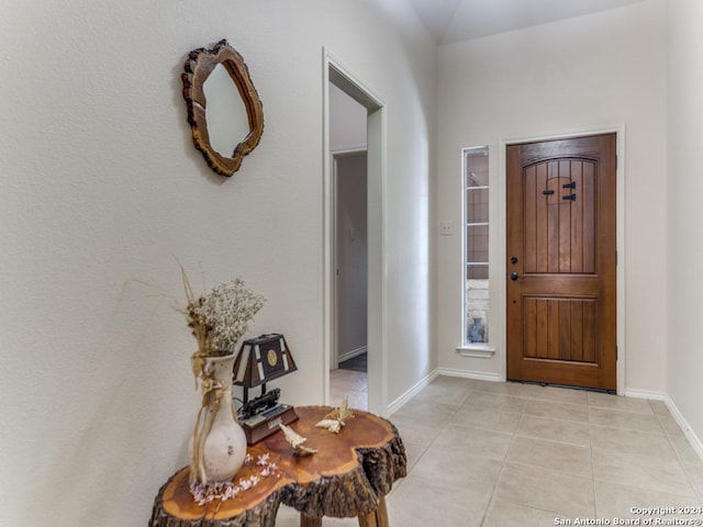 entrance foyer featuring light tile patterned floors