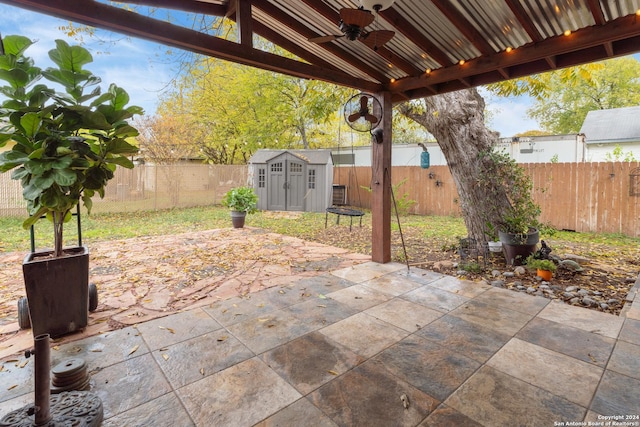 view of patio with a storage shed