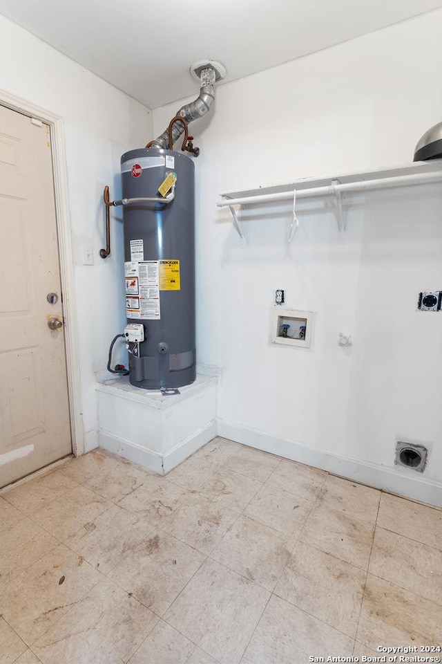 utility room featuring gas water heater