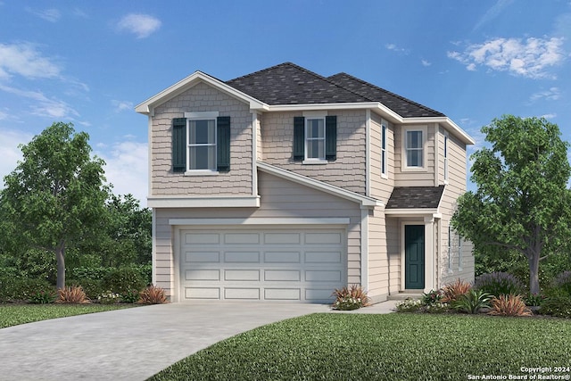 view of property featuring a front yard and a garage