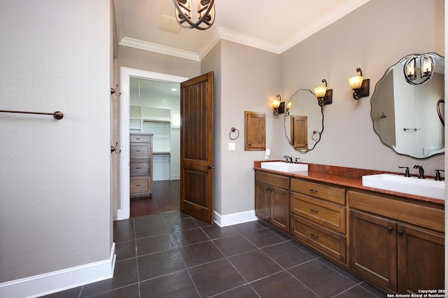 bathroom featuring tile patterned floors, vanity, and ornamental molding