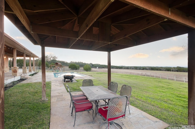 view of patio / terrace featuring a gazebo and a rural view