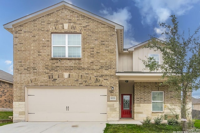 view of front of property with a garage