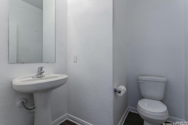 bathroom featuring toilet